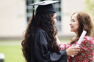 photo - Graduate Hugging her Mother