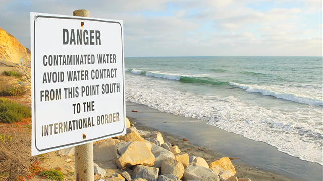 Photo of water contamination sign at beach